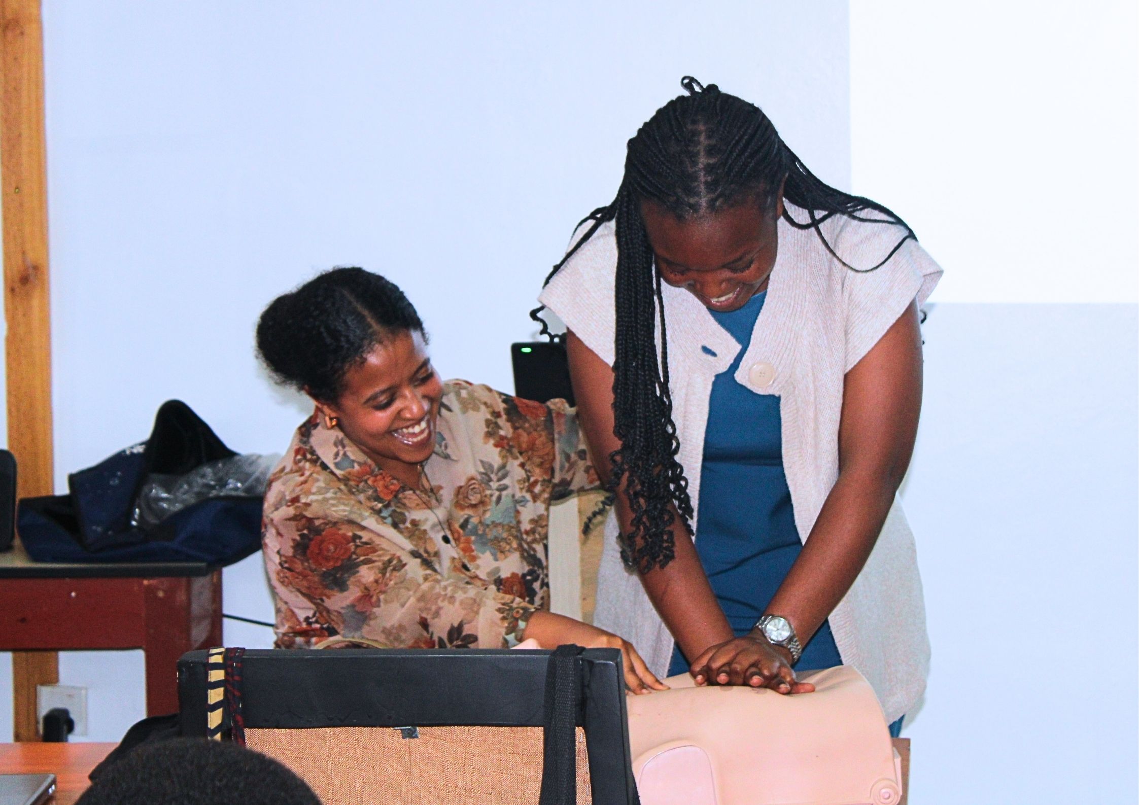 Participants practicing first aid